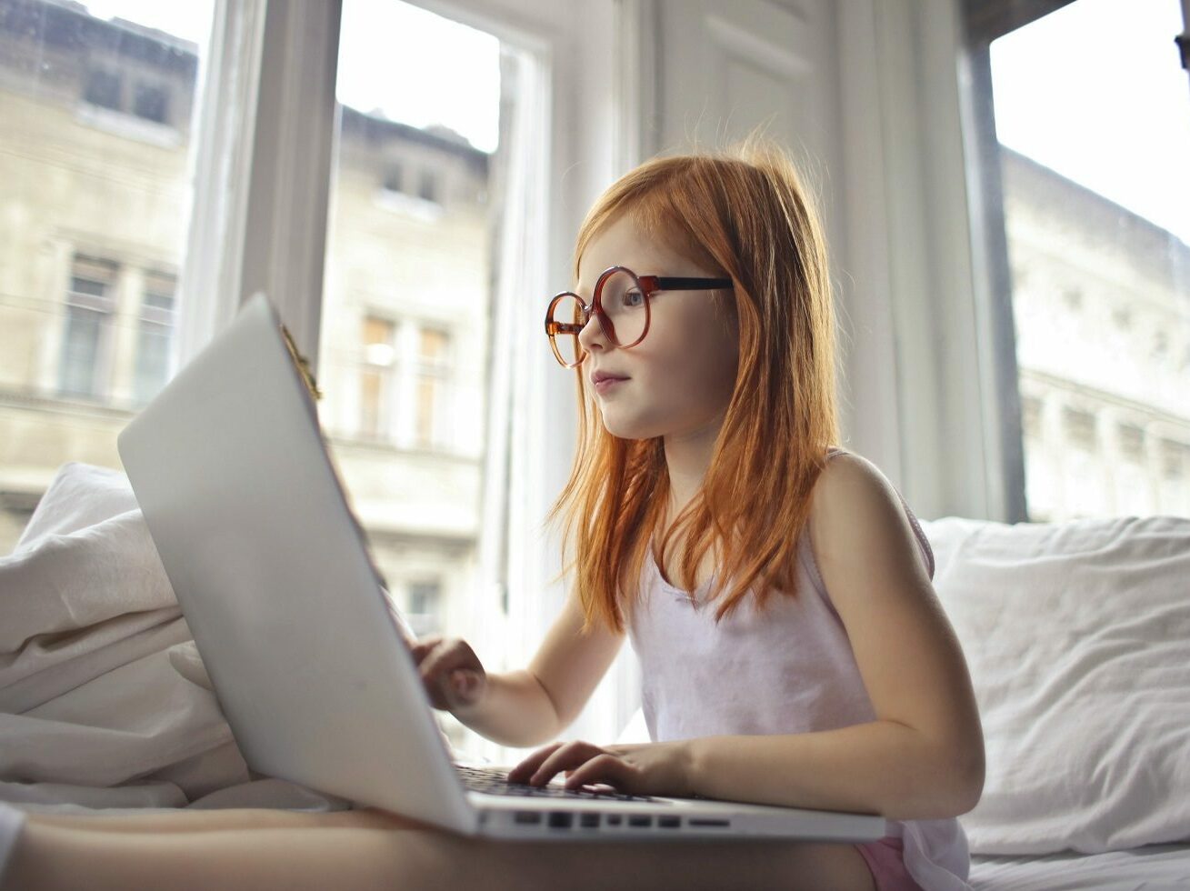 a girl watching movie on computer laptop 3761513 1 e1676557162553