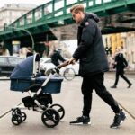 dad mit kinderwagen e1675326830315