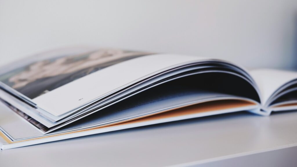 Mit einer App wie Popsa könnt ihr schnell ein tolles Fotobuch erstellen. 