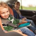 child in a car tablet maxdome1 12 e1676902016373